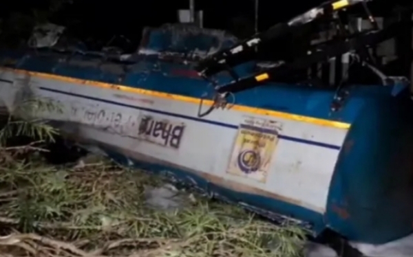 Image of the Oil Tanker Overturns After Hitting Streetlight Pole in Nagaon. Image of the Oil Tanker Overturns After Hitting Streetlight Pole in Nagaon.