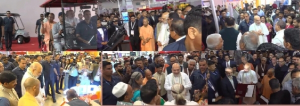 उत्तर प्रदेश इंटरनेशनल ट्रेड शो के उद्घाटन के अवसर पर स्टाल लगाने वाले लोगों से बातचीत करते हुए  केंद्रीय गृह मंत्री अमित शाह और यूपी के मुख्यमंत्री योगी आदित्यनाथ